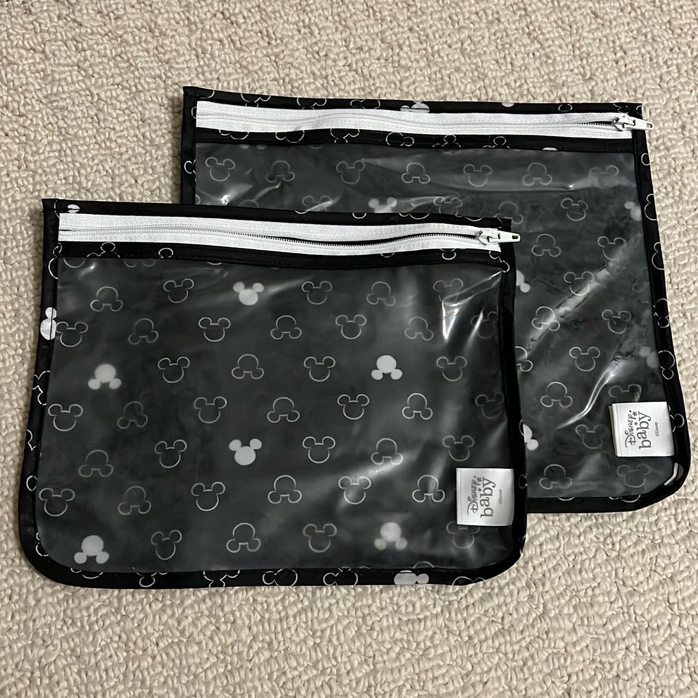 Disney Baby - set of 2 zippered storage pouches.